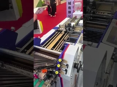 Máquina para doblar folletos de alimentación con succión de aire de carga continua